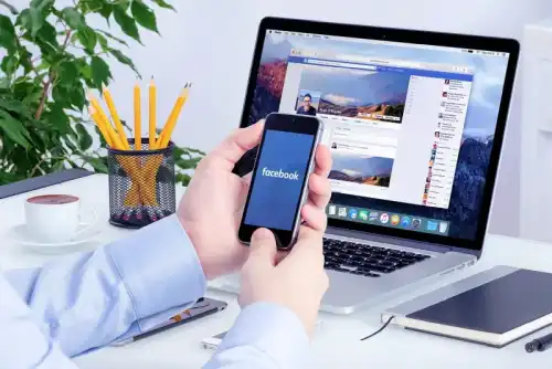 Laptop, tablet, and phone stacked together